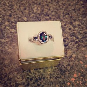 Oval cut rainbow topaz ring
